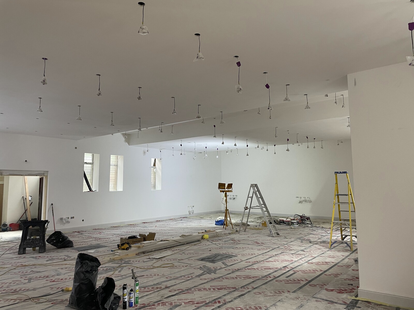 Large commercial hall protected during a complete decorating overhaul